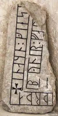 Runristning i gravkontext G176,